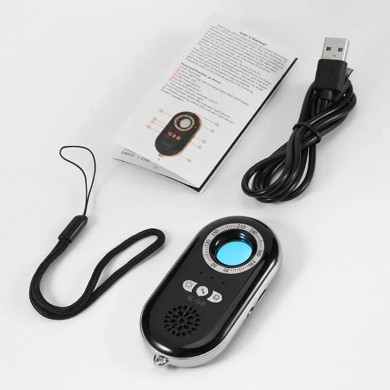 A slim, black wireless signal detector with vibration alarm for travel anti-theft security.