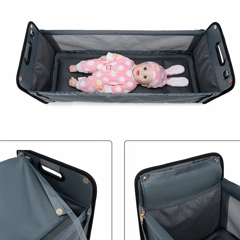 Portable shoulder baby nappy messenger bag with foldable cot, sunshade cloth, mosquito net, and soft mattress in green