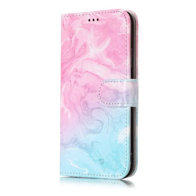 Marble flip wallet phone case with cartoon animal design for iPhone, shown open with cards stored inside.