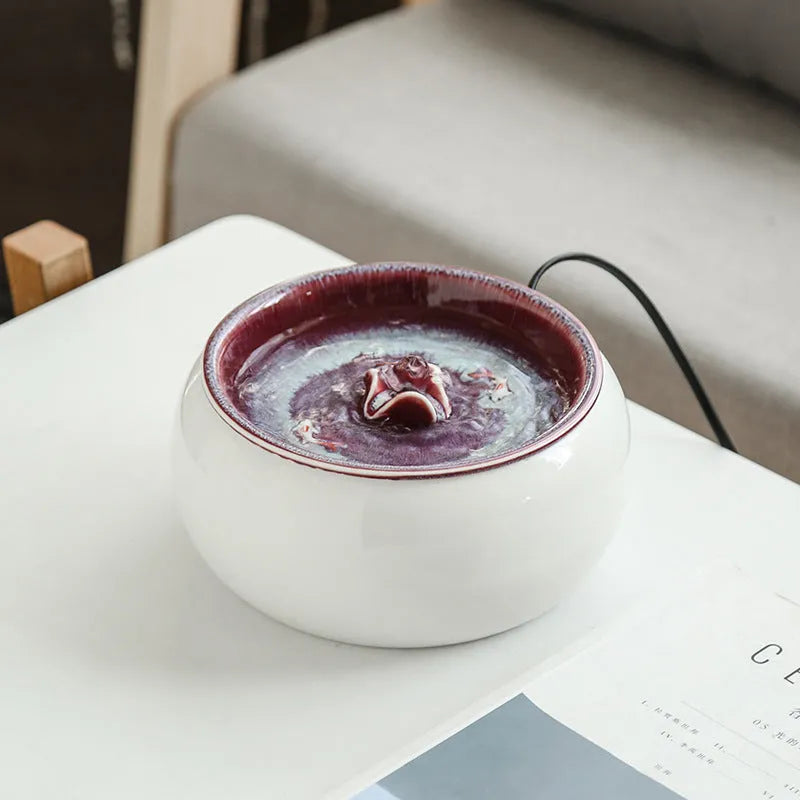 Ceramic cat automatic drinking fountain in starry sky blue with water circulation, white water pump, and USB plug option
