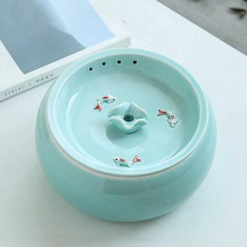 Ceramic cat automatic drinking fountain in starry sky blue with water circulation, white water pump, and USB plug option