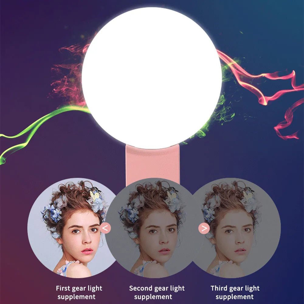 Compact clip-on LED fill light for mobile phone selfies and video, shown in blue.