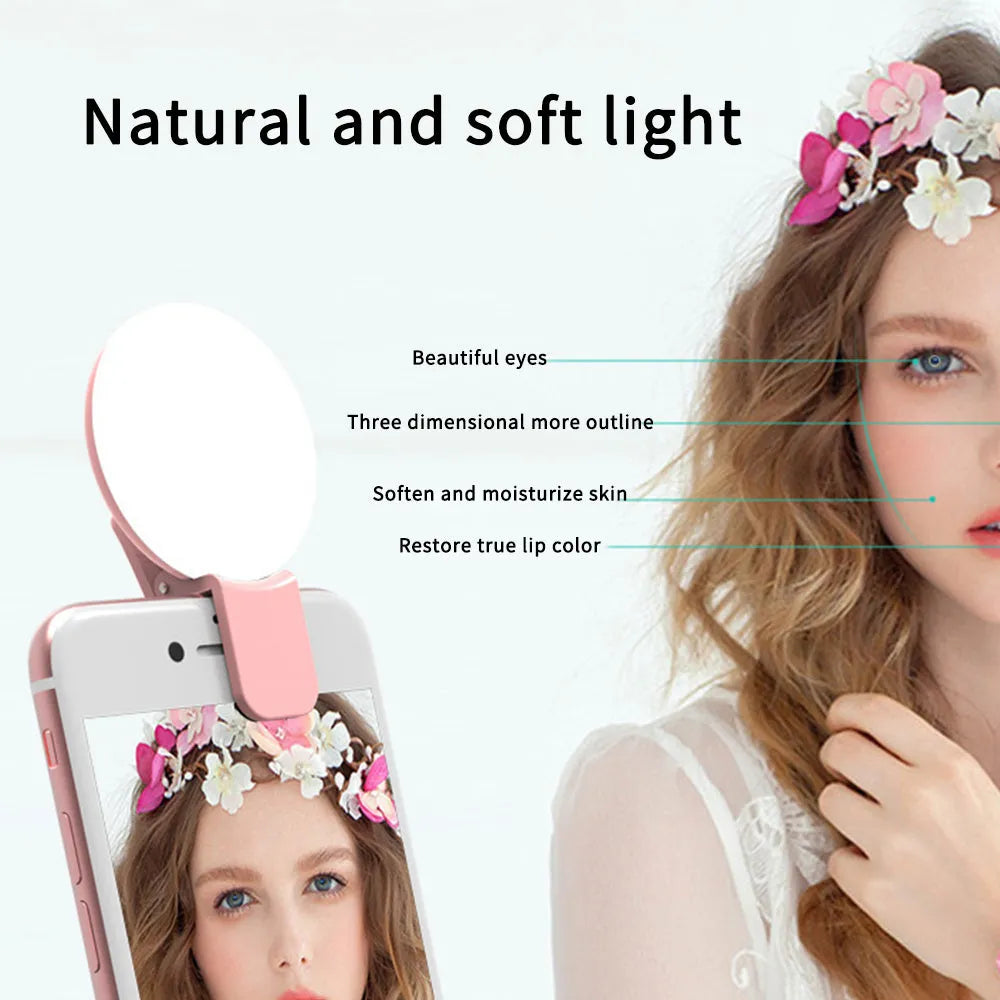 Compact clip-on LED fill light for mobile phone selfies and video, shown in blue.