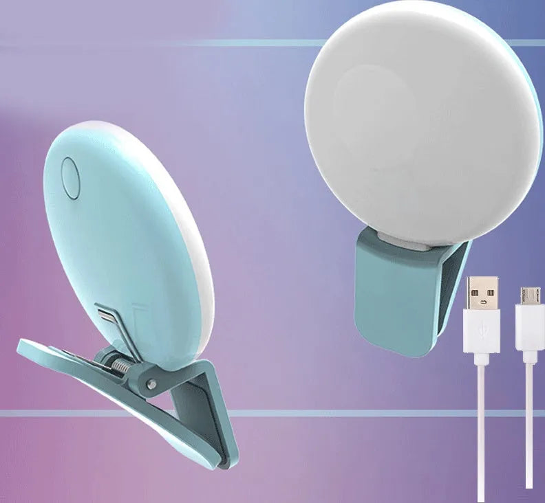 Compact clip-on LED fill light for mobile phone selfies and video, shown in blue.