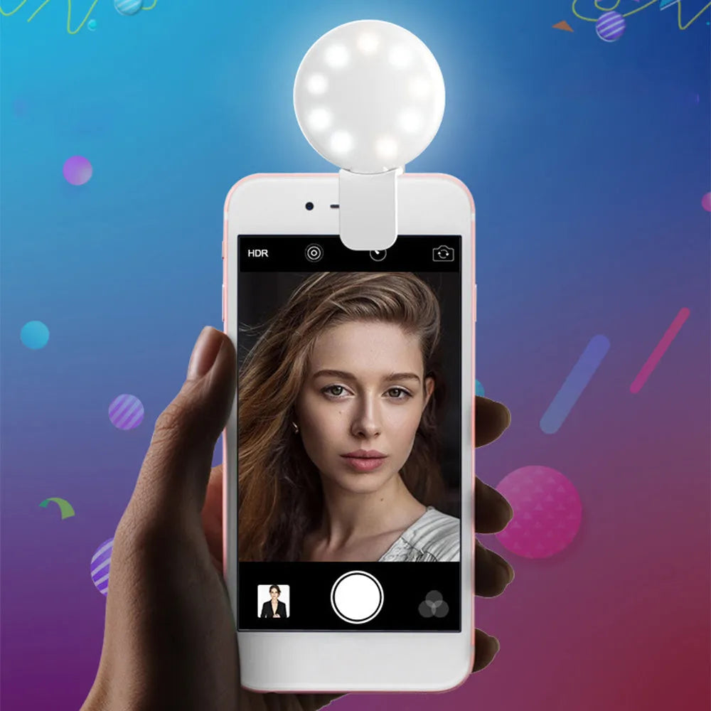 Compact clip-on LED fill light for mobile phone selfies and video, shown in blue.