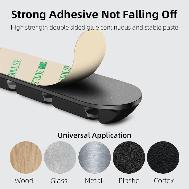 Black soft plastic desktop magnetic cable organiser and charging base stand.