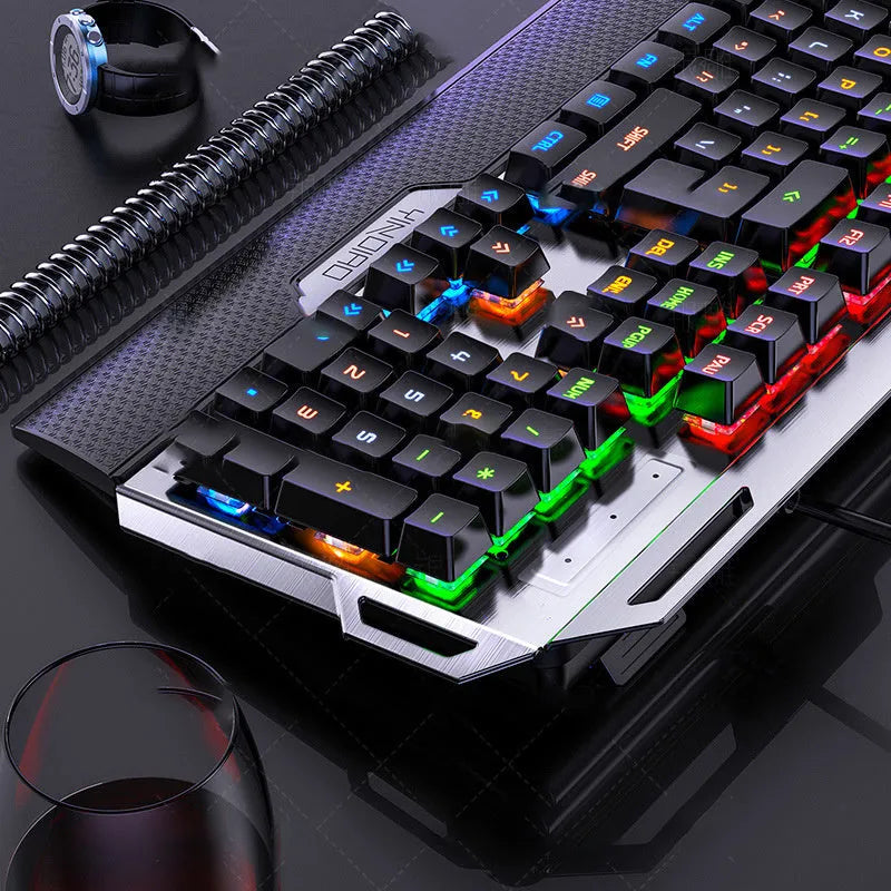 Silver Carving K100 black mechanical keyboard with hand rest and phone holder on desk