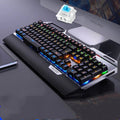 Silver Carving K100 black mechanical keyboard with hand rest and phone holder on desk