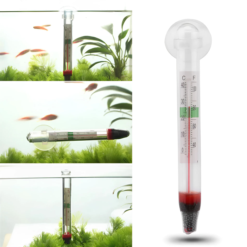 White glass aquarium fat thermometer with suction cup floating on water surface showing temperature scale