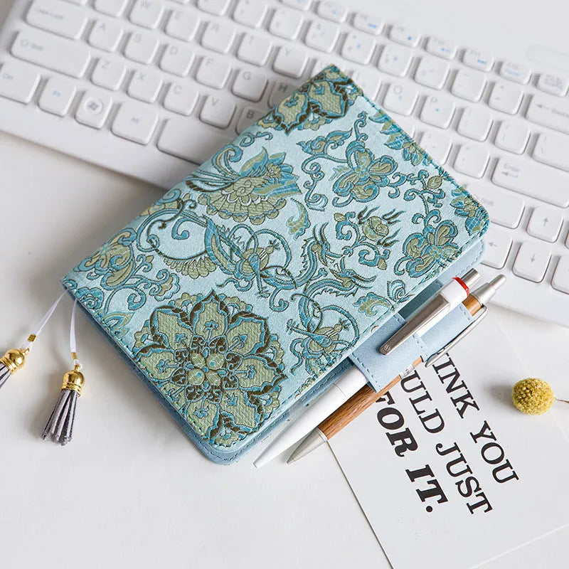 Flying blue flower fabric cover notebook in A5 size with spiral binding