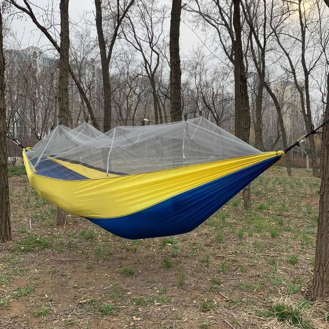 Automatic mosquito net anti-rollover parachute cloth hammock in blue, outdoor setting, 300kg load capacity