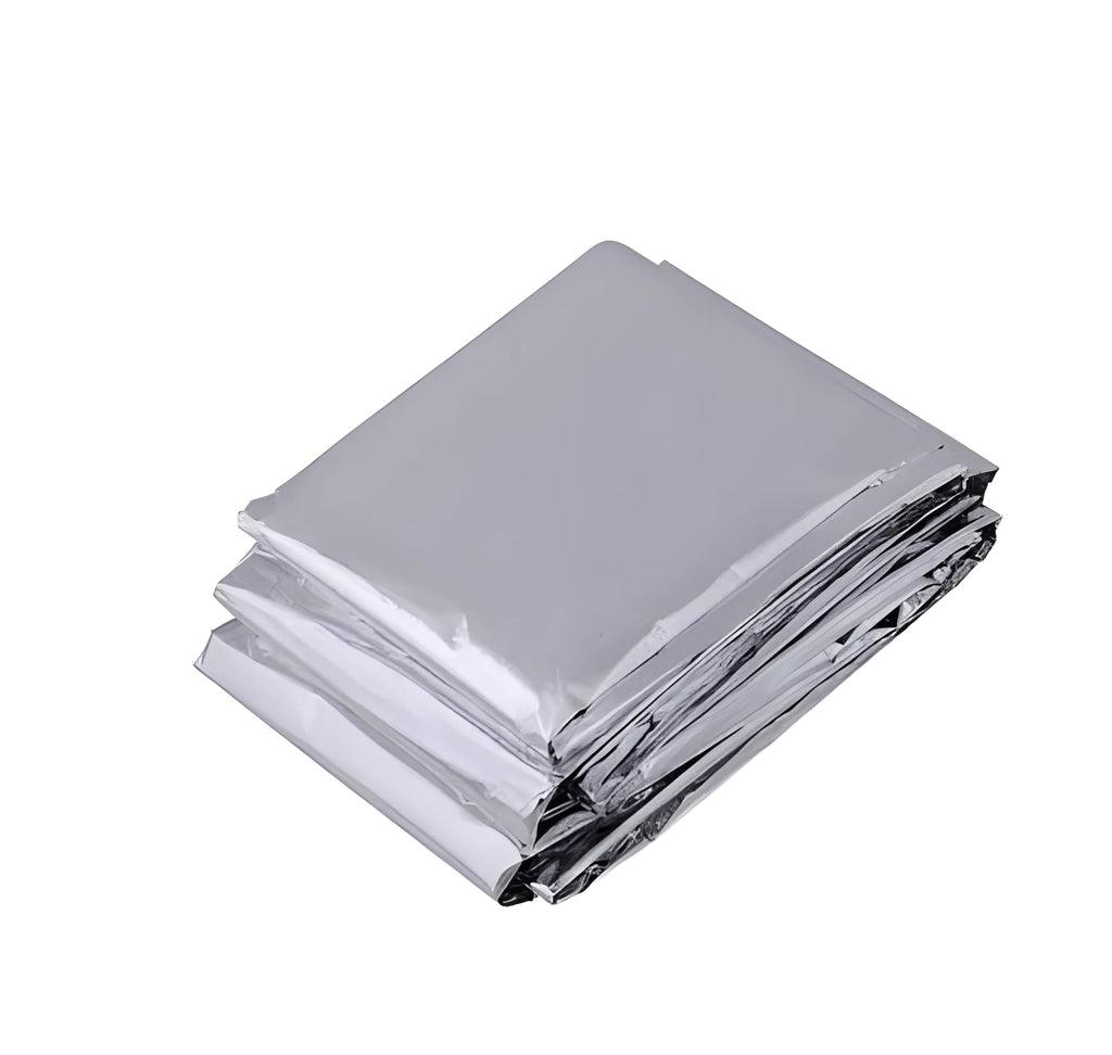 Gold silver emergency blanket made from PET film with reflective coating, 130x210cm size, for outdoor survival and rescue.