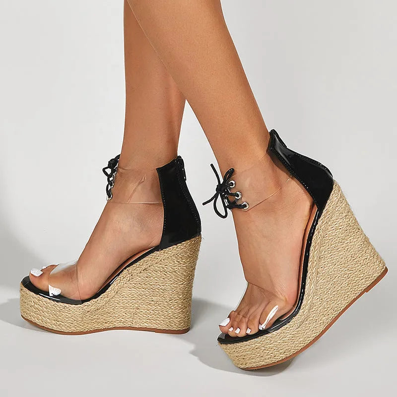 Black women's wedge sandals with hemp rope detail and a super high platform heel.