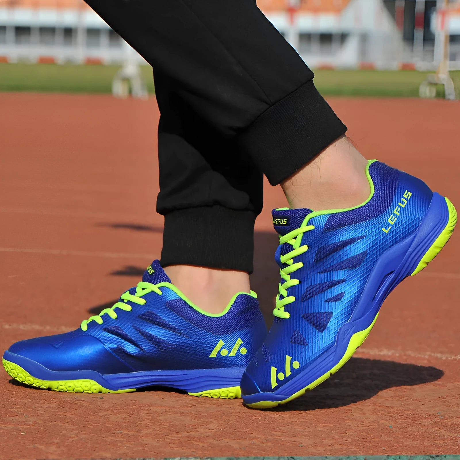 Men's L010 blue badminton shoes with mesh upper and rubber sole