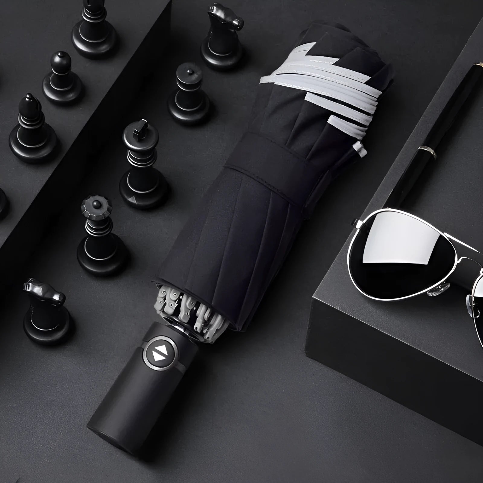 Automatic reverse folding umbrella with reflective cloth in black colour, showing folded length.