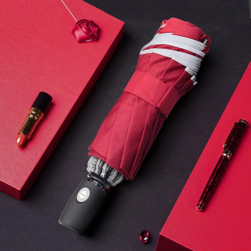 Automatic reverse folding umbrella with reflective cloth in black colour, showing folded length.