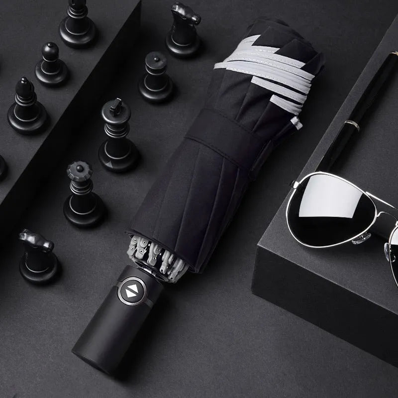 Automatic reverse folding umbrella with reflective cloth in black colour, showing folded length.