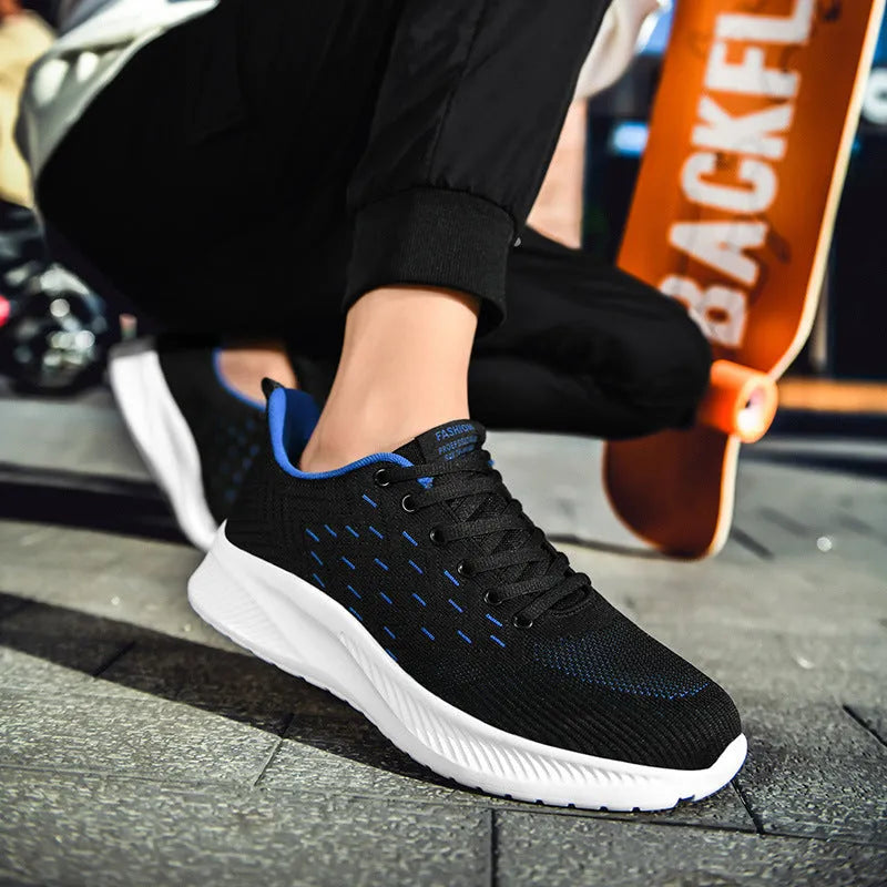 Men's breathable lightweight running shoes in grey with woven fabric upper and cross-strap design