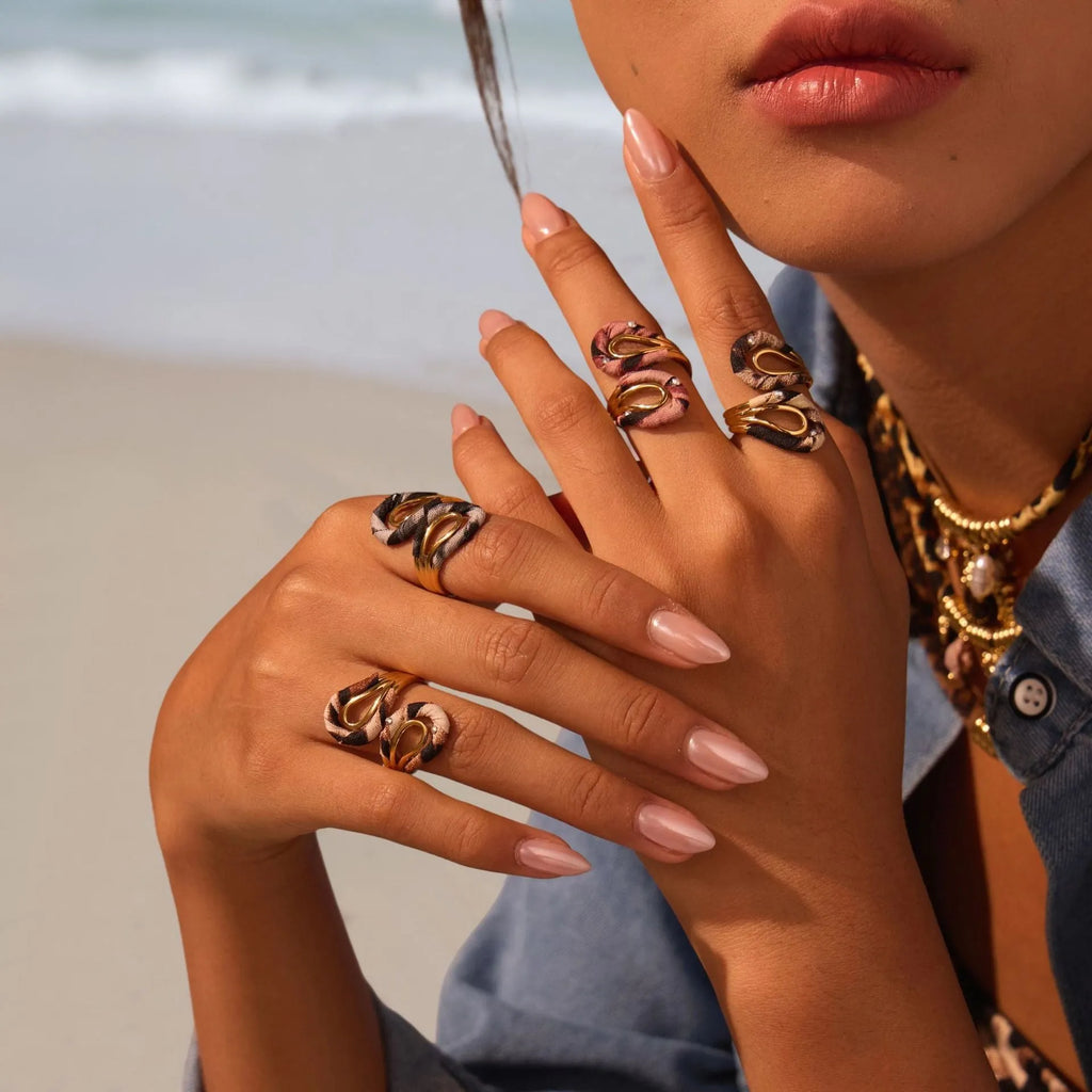 Leopard Series stainless steel open mouth ring with heart, star, and geometric shapes in adjustable free size