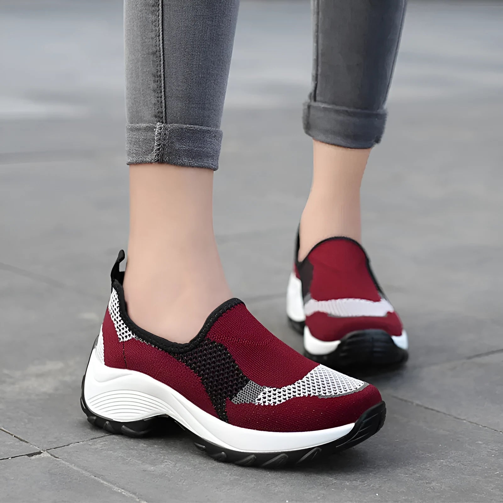 Ladies casual mesh wedge heel platform shoes in black, side view showing hollow mesh upper and round toe