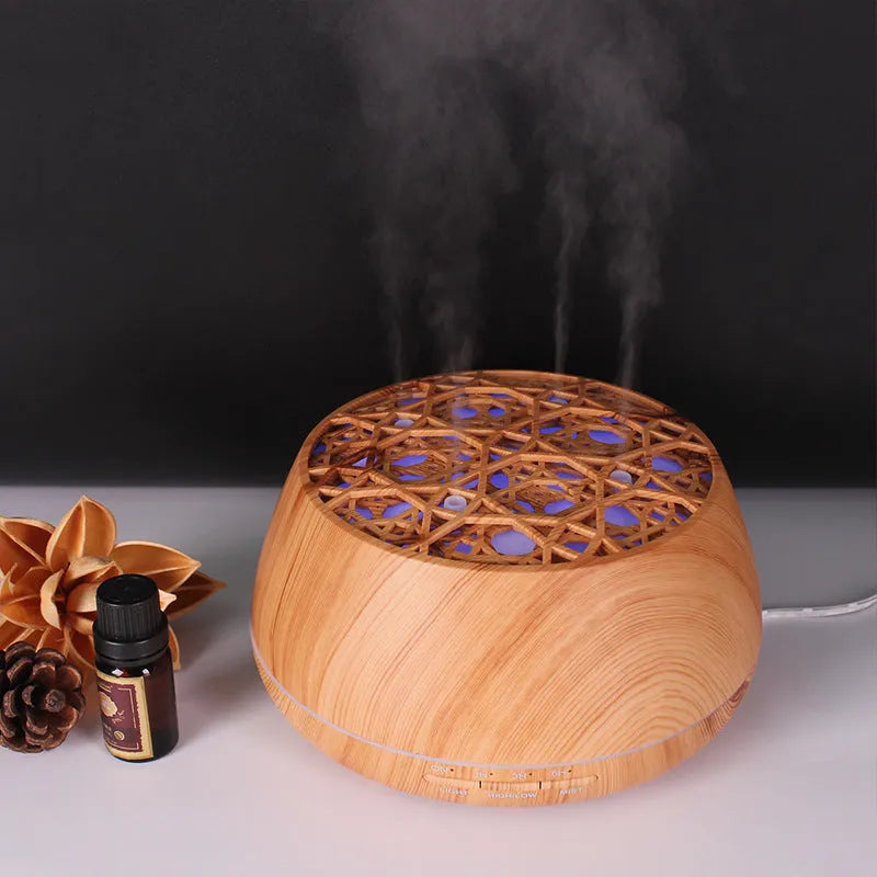 Four-hole misting ultrasonic aroma diffuser in dark wood grain finish with 400ml capacity and control buttons