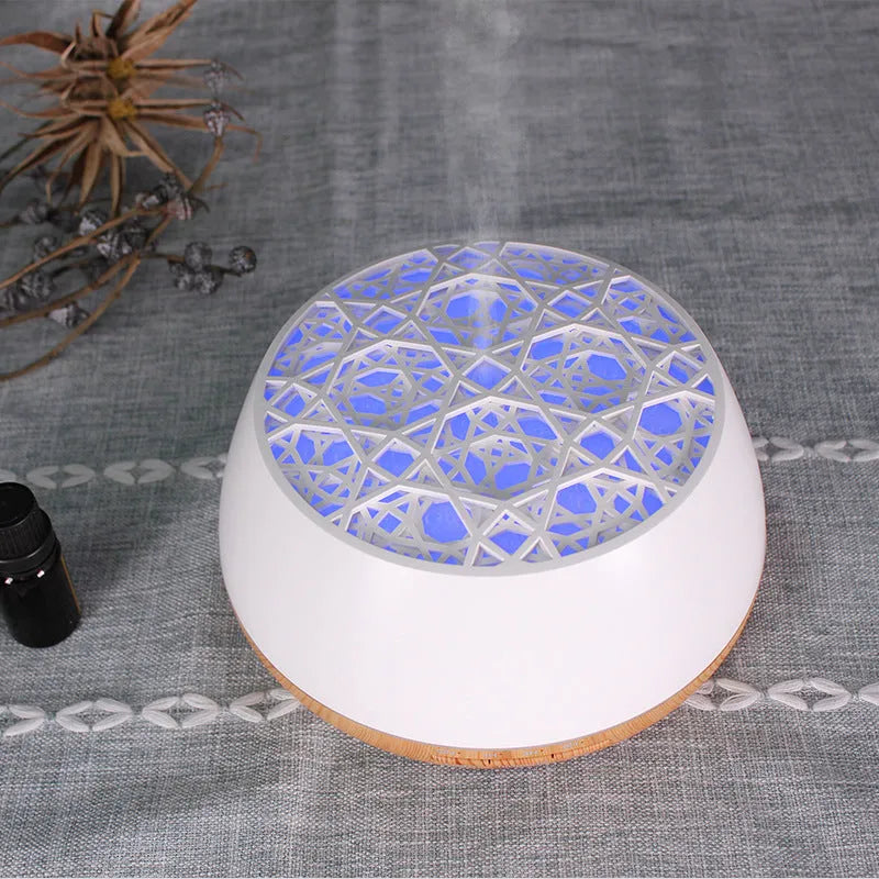 Four-hole misting ultrasonic aroma diffuser in dark wood grain finish with 400ml capacity and control buttons