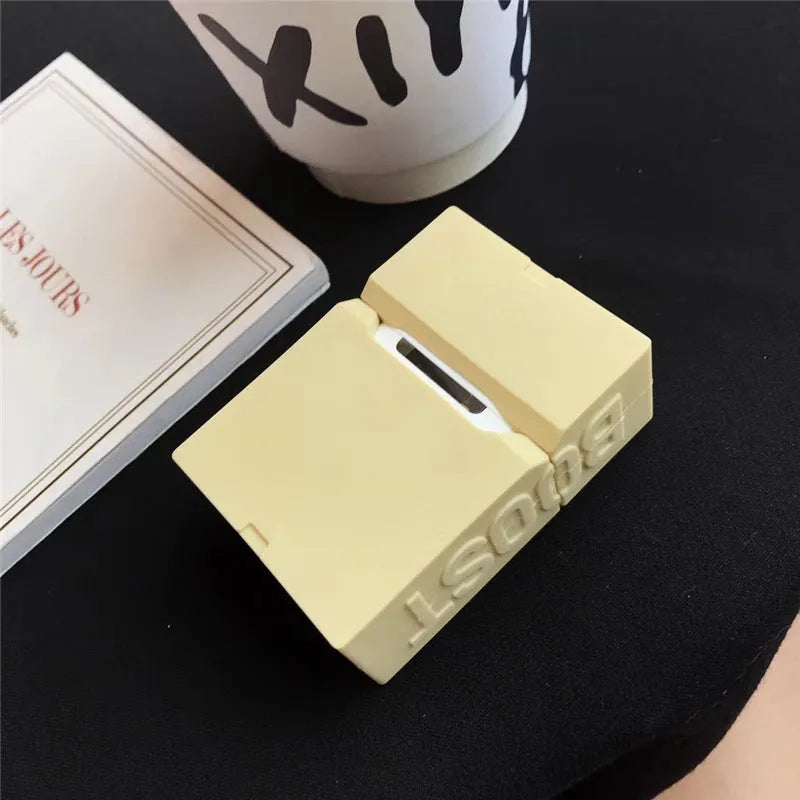 Silicone protective sleeve case for Apple AirPods 1 and 2 with a metal carabiner clip attached.