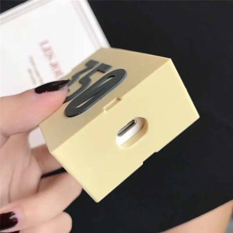 Silicone protective sleeve case for Apple AirPods 1 and 2 with a metal carabiner clip attached.