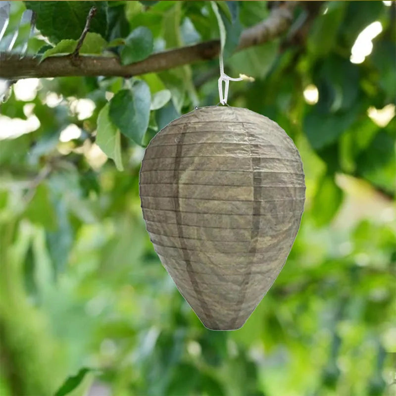 A collapsible paper and wire beehive lantern measuring 22 by 28 centimetres in a photo colour finish.