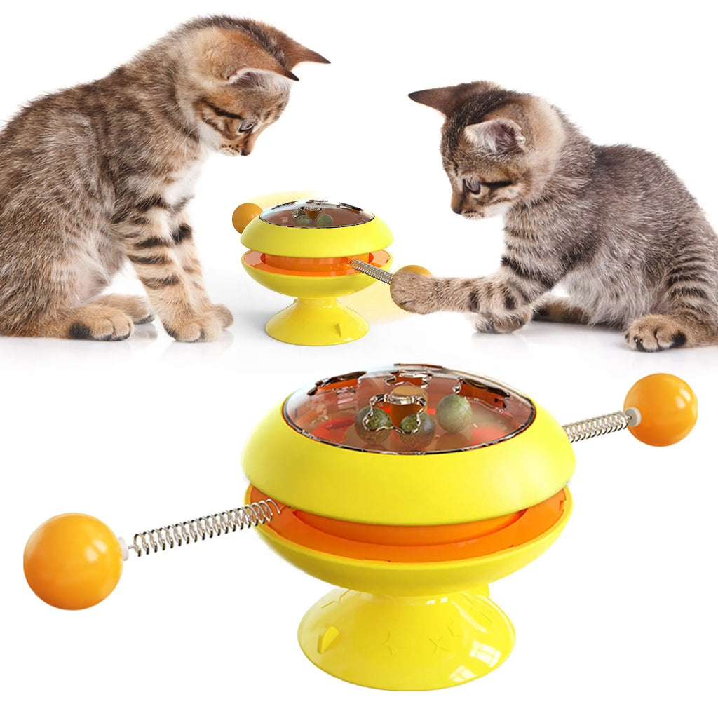Rotatable interactive cat toy with suction cup base and colourful turntable featuring catnip balls.