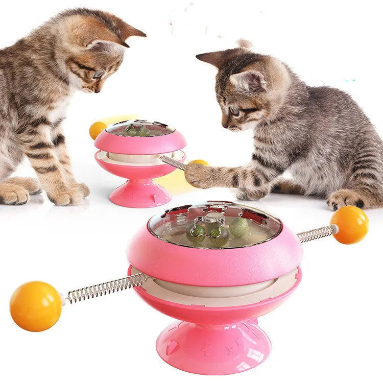 Rotatable interactive cat toy with suction cup base and colourful turntable featuring catnip balls.