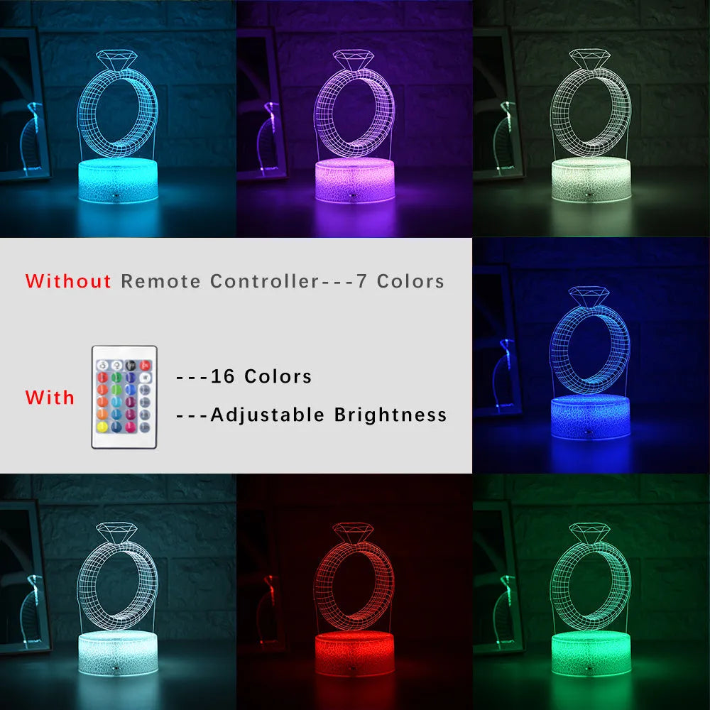 3D LED night light glowing with colour-changing light on a diamond ring laser engraving inside a black base.