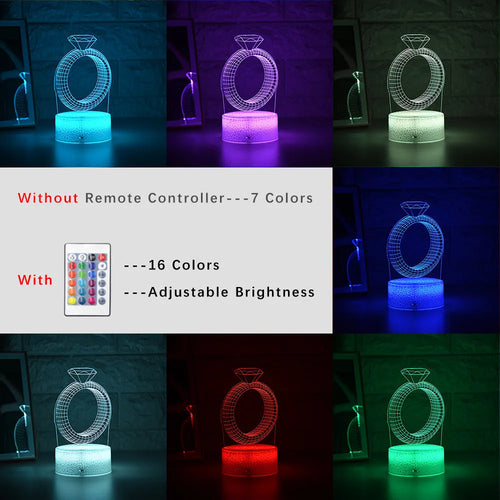 3D LED night light glowing with colour-changing light on a diamond ring laser engraving inside a black base.
