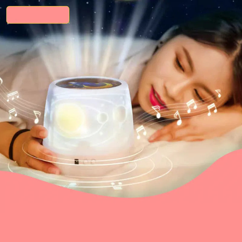 Smart rotating LED projector night light showing star patterns on a bedroom ceiling.