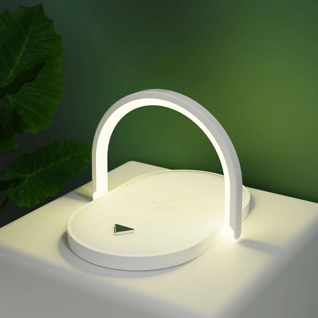 Black wireless charging pad with integrated phone holder and night light, showing 15W fast charging capability