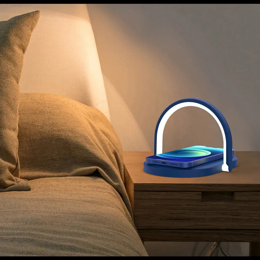Black wireless charging pad with integrated phone holder and night light, showing 15W fast charging capability