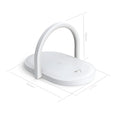 Black wireless charging pad with integrated phone holder and night light, showing 15W fast charging capability