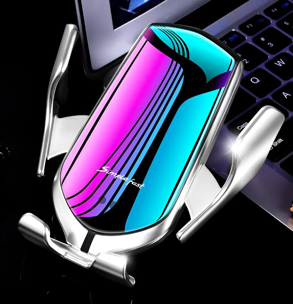 Automatic wireless charging car phone holder clipped to car air vent in silver finish