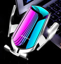 Automatic wireless charging car phone holder clipped to car air vent in silver finish