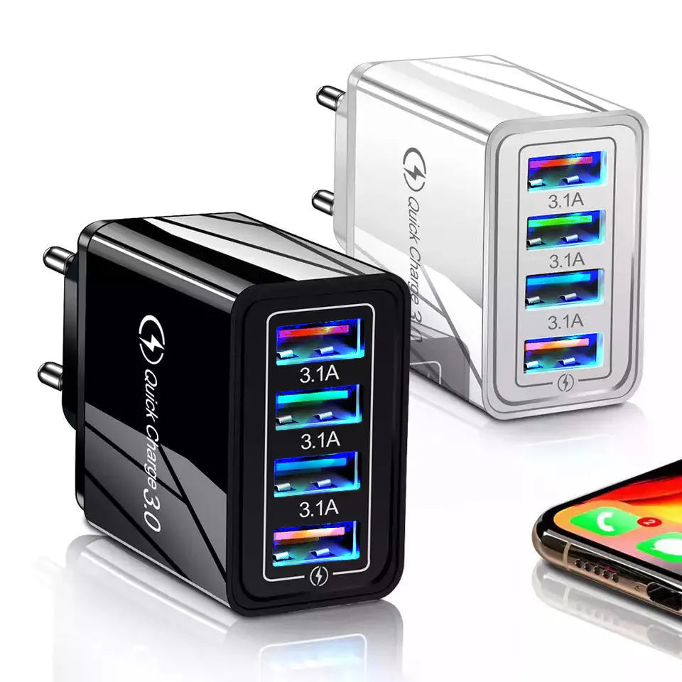 Simple Luminous 4-port USB wall charger with UK plug in dark blue, showing four USB ports and power light.