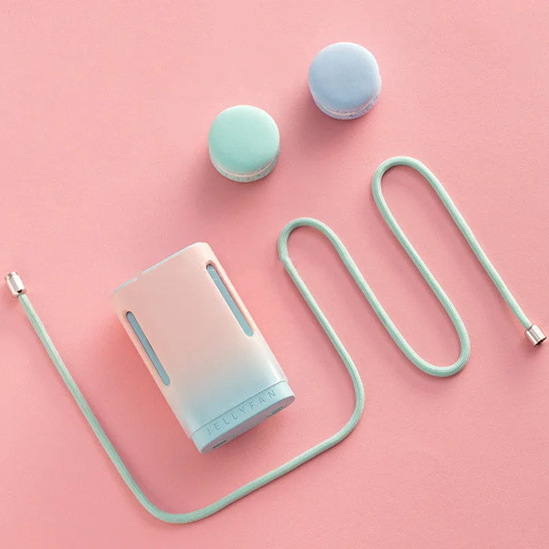 Jelly USB hanging neck personal cooling fan in mint peach colour with dual handheld and neck-worn modes