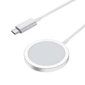 White 15W magnetic wireless charger for MagSafe iPhones on desk with 1m cable