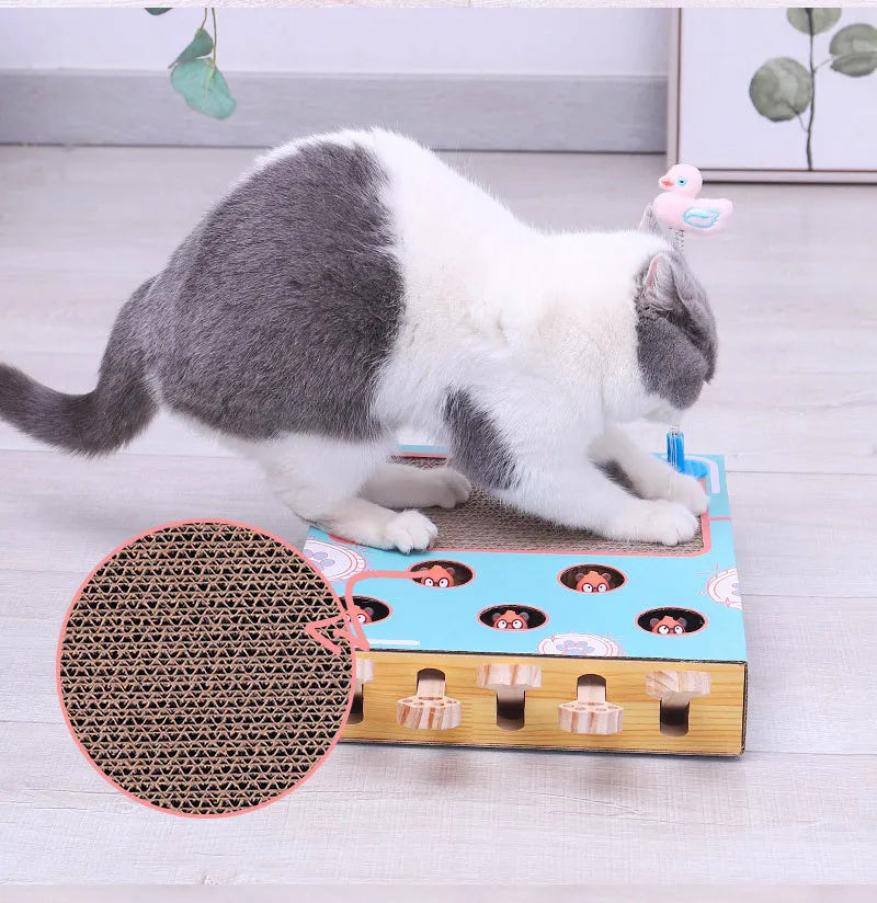 Blue whack-a-mole cat toy made from cardboard and wood, measuring 36x26x6cm for indoor use