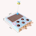 Blue whack-a-mole cat toy made from cardboard and wood, measuring 36x26x6cm for indoor use