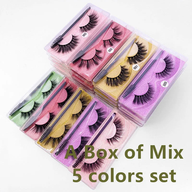Pair of natural 3D imitation mink false eyelashes with brush in elongated eye-tail style