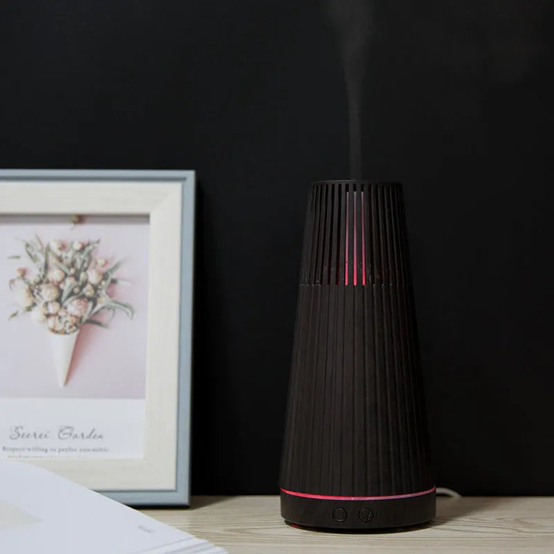 Natural wood grain ultrasonic aroma diffuser in black with USB cable, quiet operation under 36dB