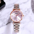 Women's quartz analogue watch with 32mm rose gold dial, alloy strap, and matching titanium steel heart-shaped necklace set