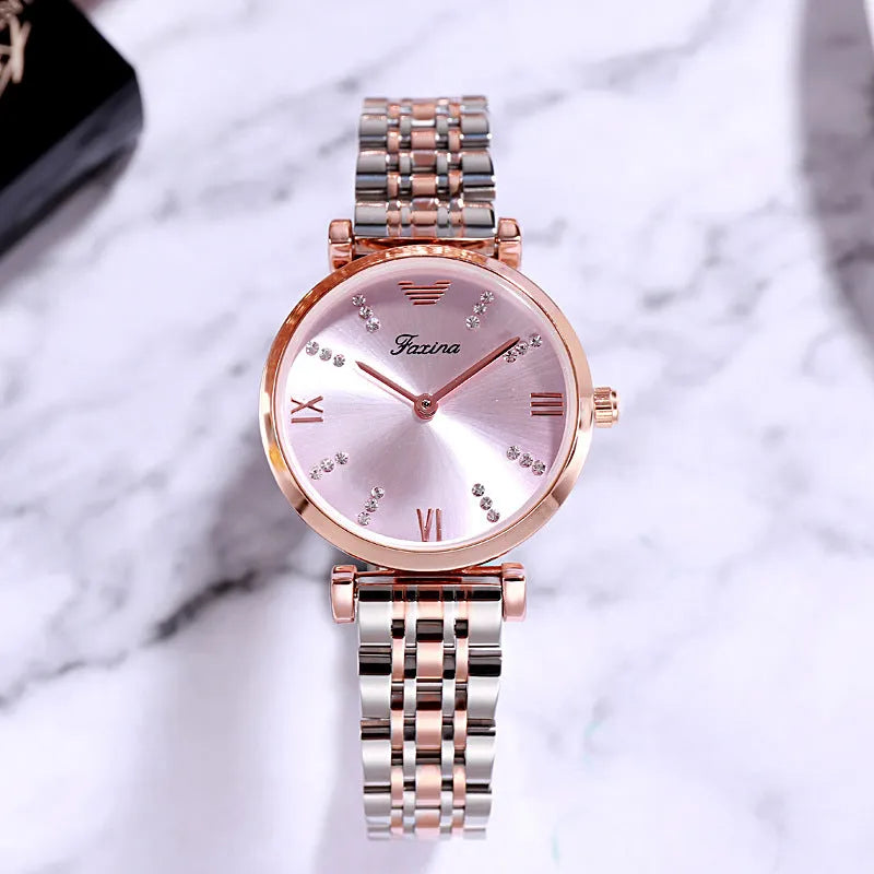 Women's quartz analogue watch with 32mm rose gold dial, alloy strap, and matching titanium steel heart-shaped necklace set
