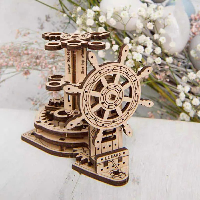 Solid wooden steering wheel pen holder with central pencil compartment on a desk