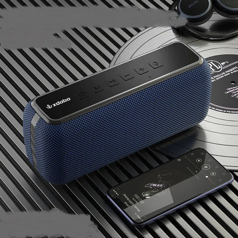 The New Size Small Sound Big X8 subwoofer Bluetooth speaker in black, with dual 30W drivers and portable design